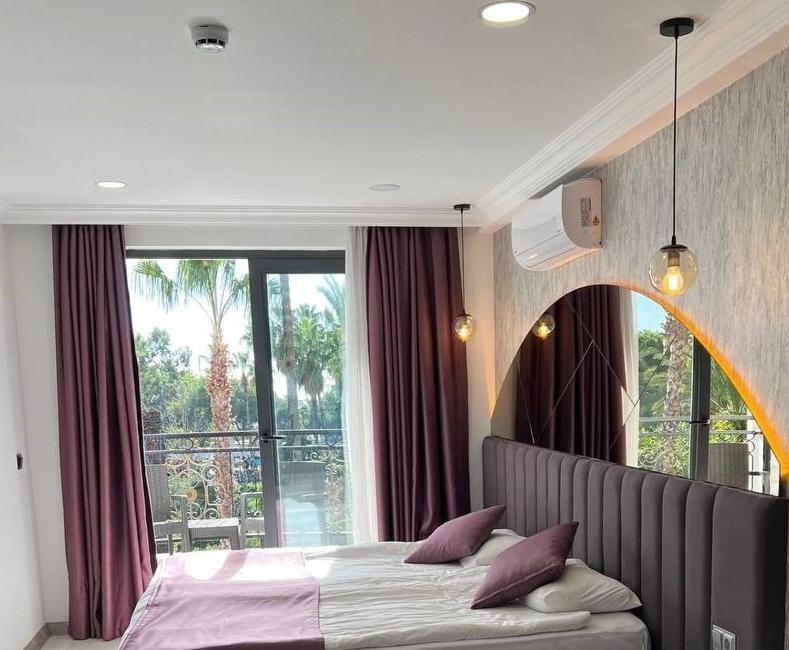 Hotel Karikatuer Bi