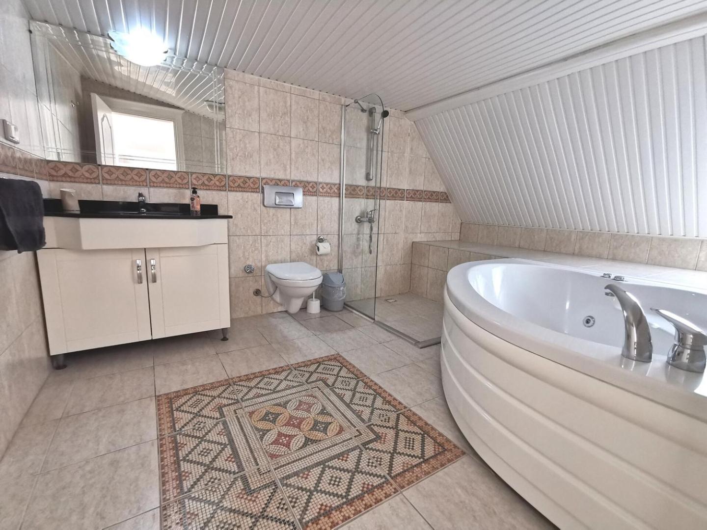 With A Pool And Jacuzzi Holiday home