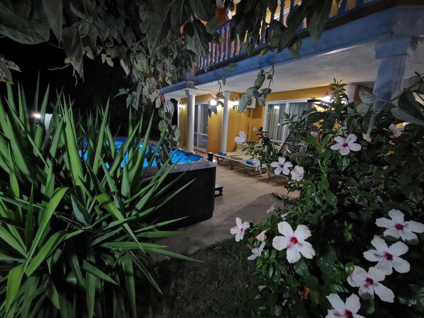 With A Pool And Jacuzzi