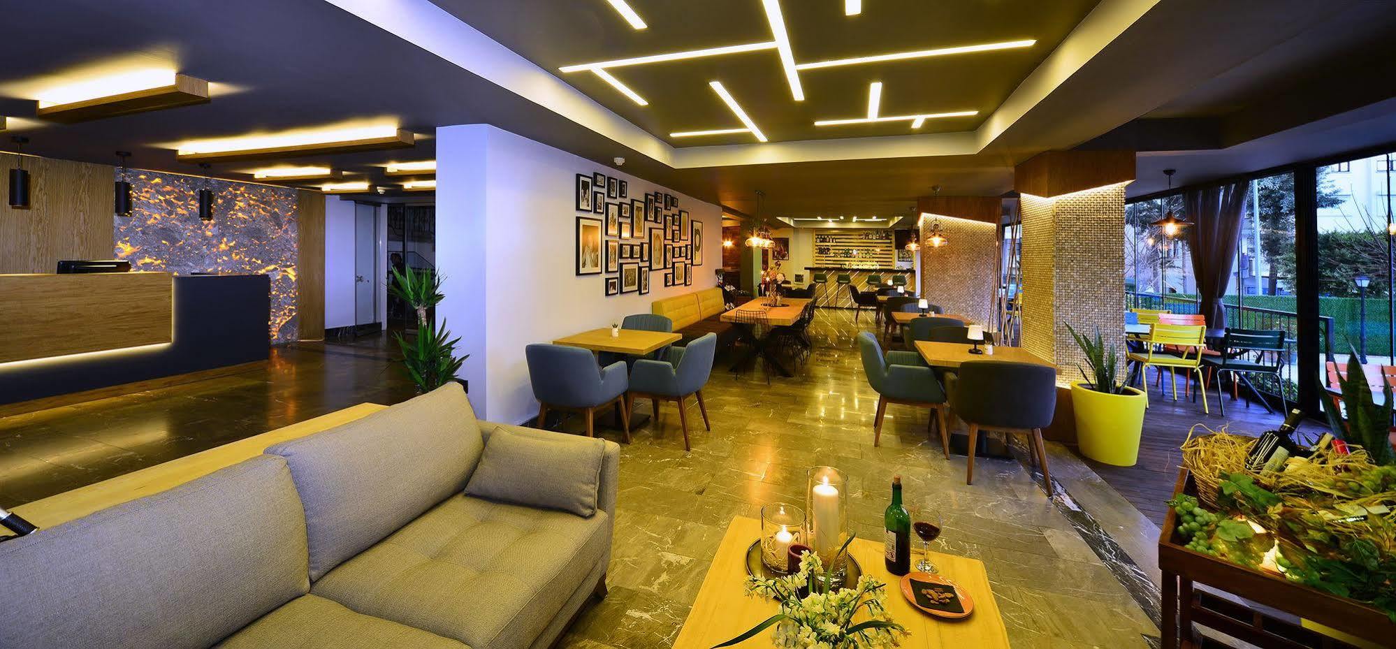 & Aparthotel