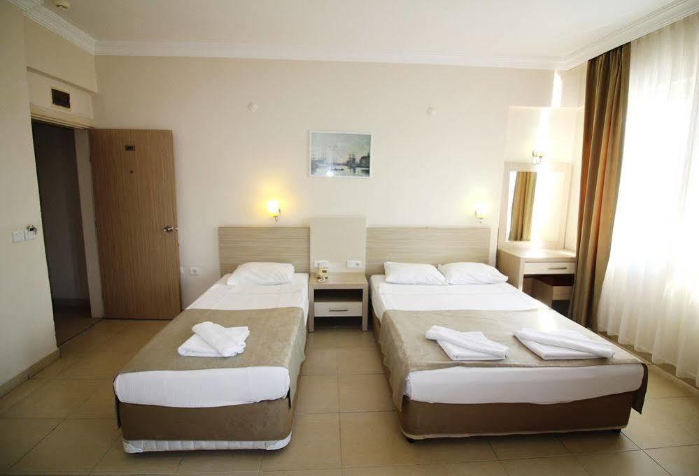 & Aparthotel