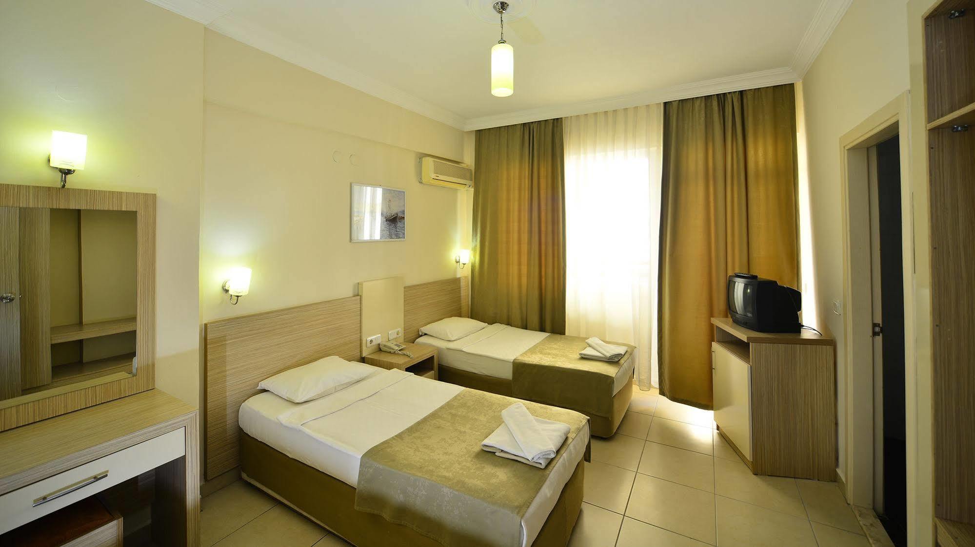& Aparthotel