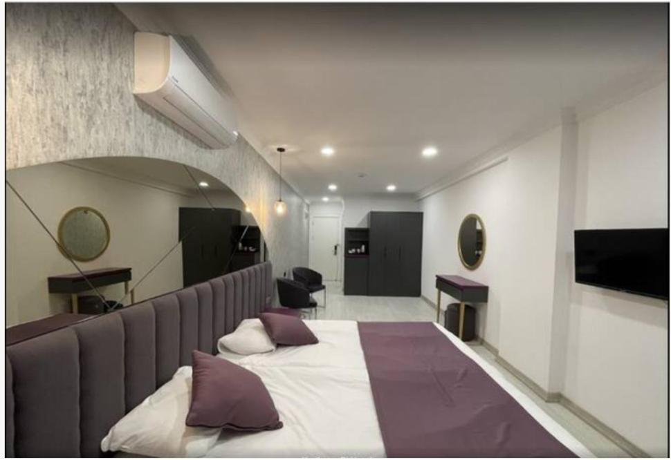 Hotel Karikatuer Bi